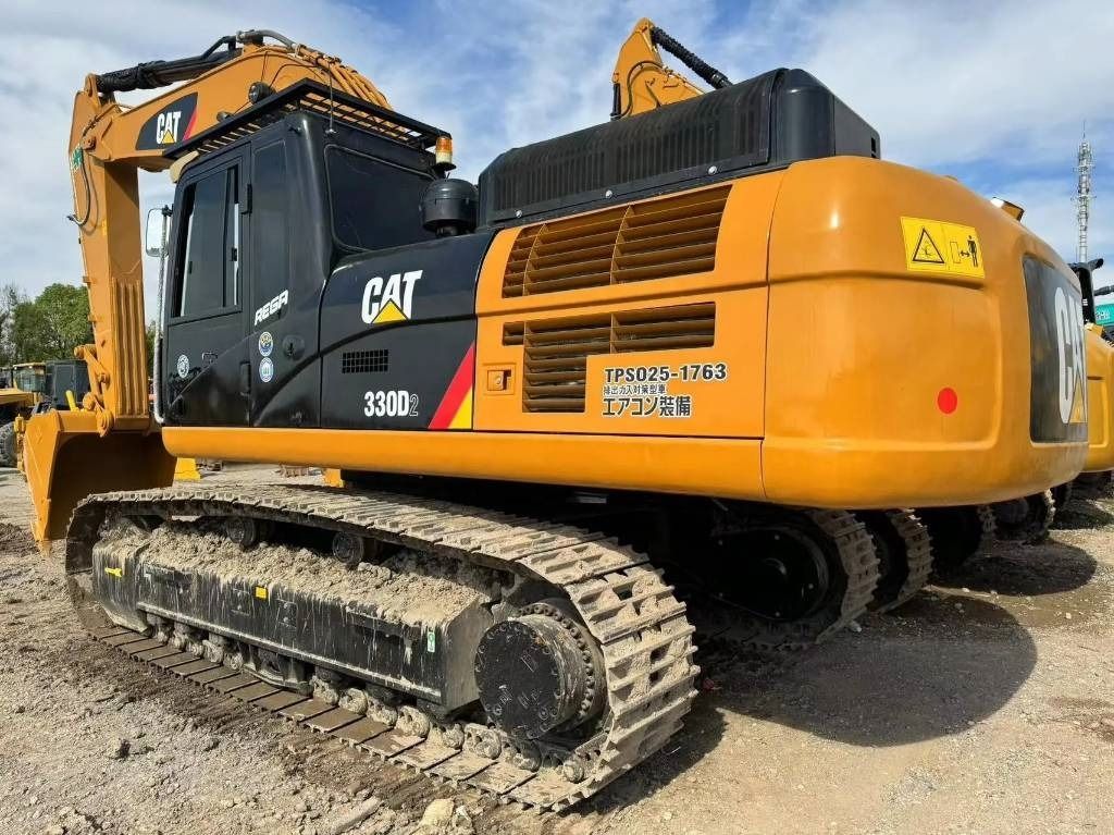 2022 Caterpillar 330D2 excavator, rear three-quarter view