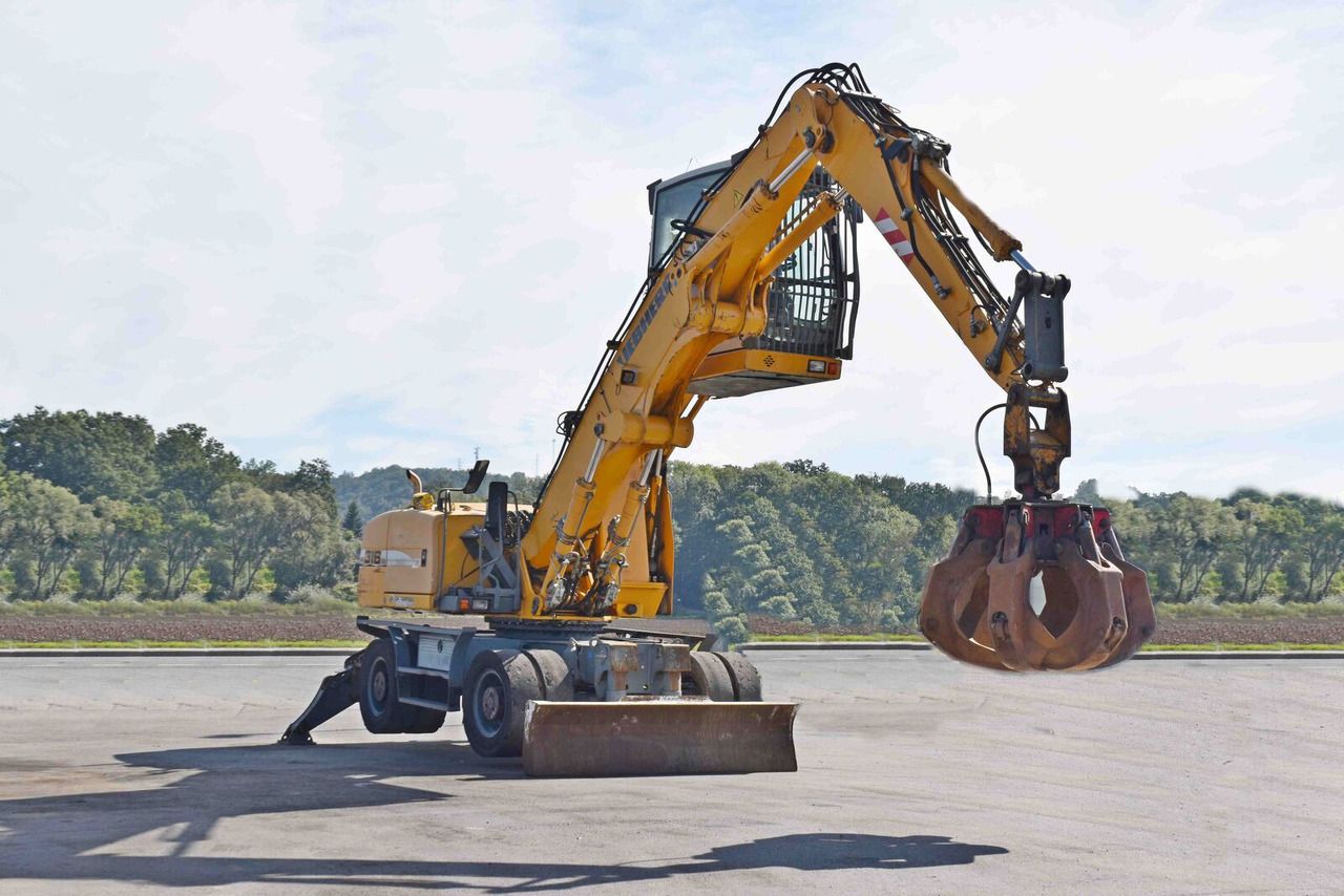 2008 Liebherr A316 material handler, side view 2008 Liebherr A316 material handler, side view