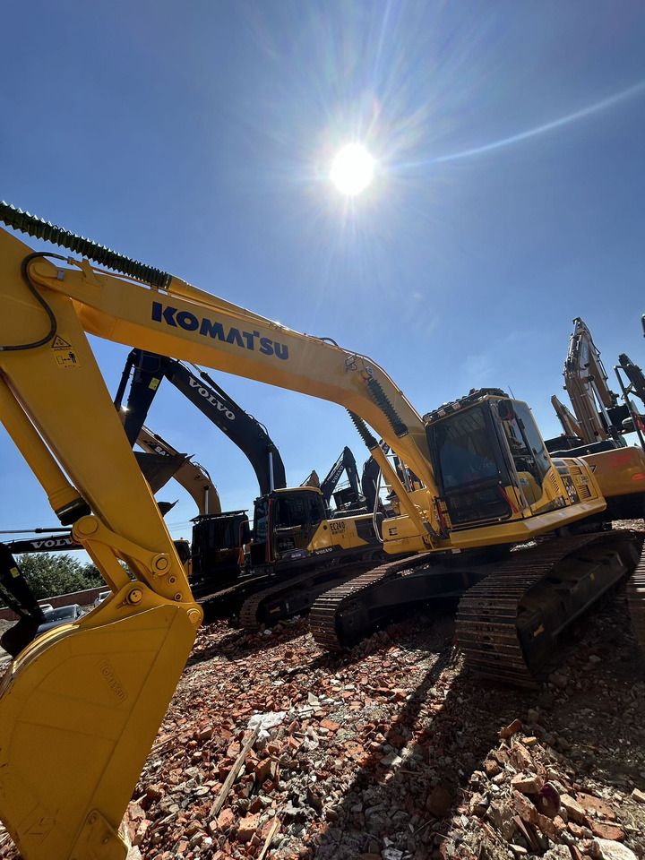 2023 Komatsu PC240-8 crawler excavator, low angle view 2023 Komatsu PC240-8 crawler excavator, low angle view