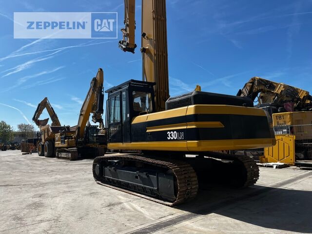 1996 Caterpillar 330LN demolition excavator, rear three-quarter view 1996 Caterpillar 330LN demolition excavator, rear three-quarter view