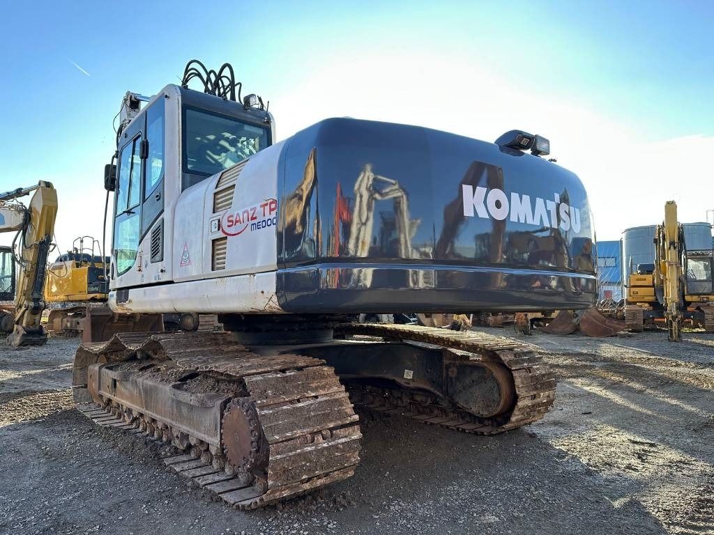2012 Komatsu PC240NLC-8 crawler excavator, rear three-quarter view 2012 Komatsu PC240NLC-8 crawler excavator, rear three-quarter view