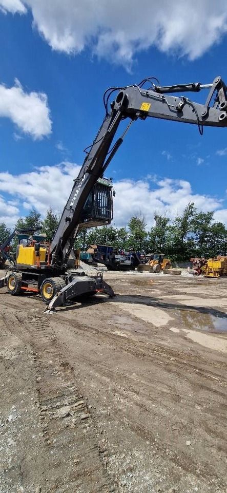 2018 Volvo EW240EMH material handler, side view