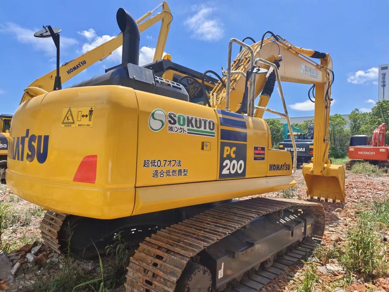2023 Komatsu PC200 crawler excavator rear three-quarter view 2023 Komatsu PC200 crawler excavator rear three-quarter view