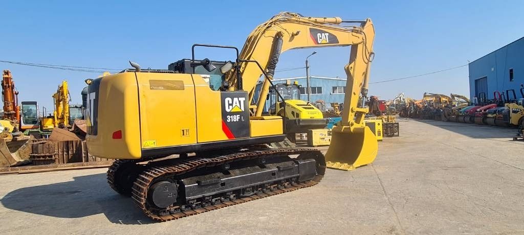 2020 Caterpillar 318FL crawler excavator, rear three-quarter view 2020 Caterpillar 318FL crawler excavator, rear three-quarter view