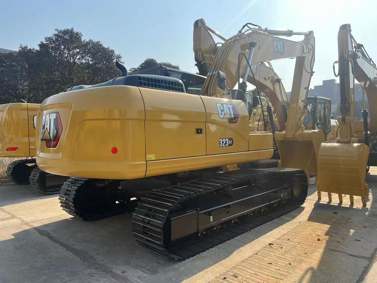 2026 Caterpillar 323GX crawler excavator rear three-quarter view 2026 Caterpillar 323GX crawler excavator rear three-quarter view