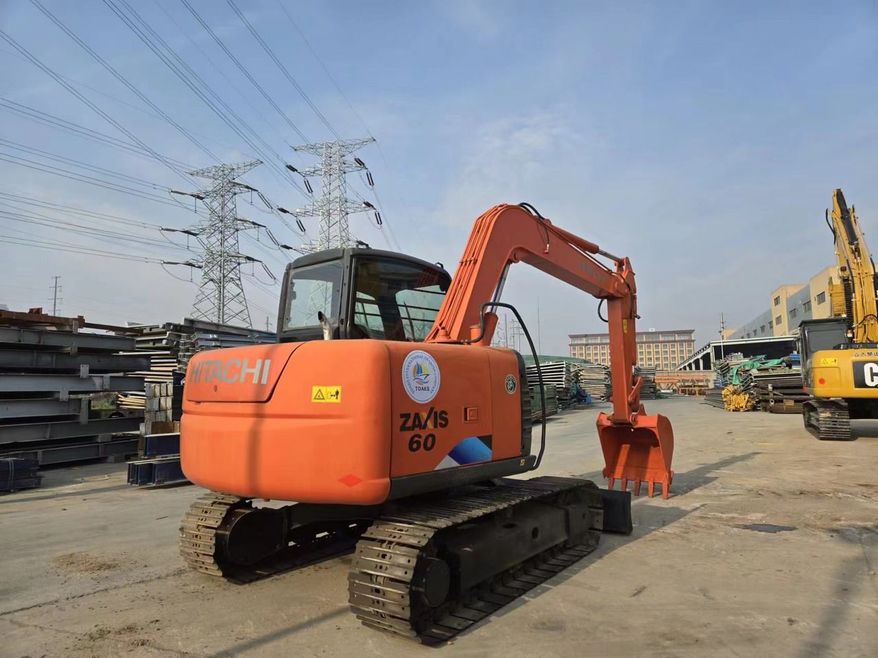 2022 Hitachi Zaxis 60 mini excavator, rear three-quarter view 2022 Hitachi Zaxis 60 mini excavator, rear three-quarter view