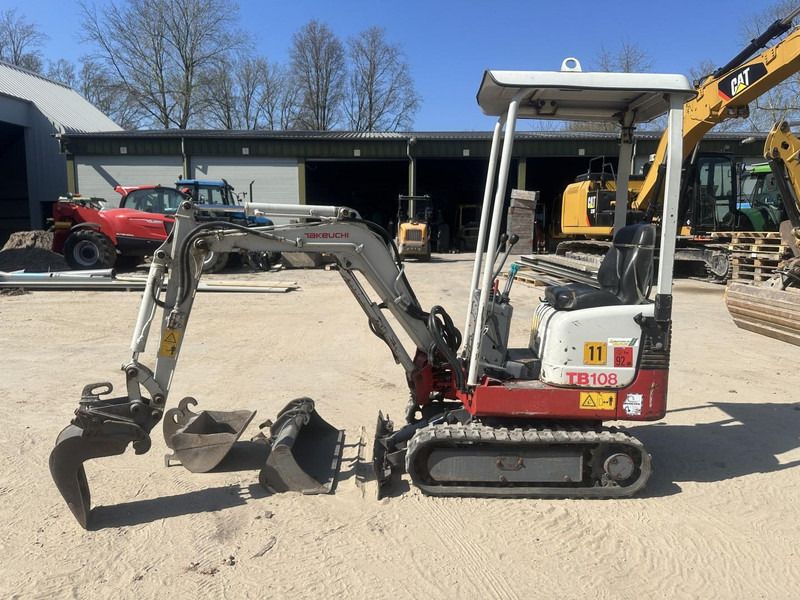 2013 Takeuchi TB108 mini excavator, side view 2013 Takeuchi TB108 mini excavator, side view