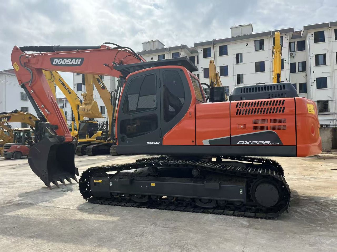 2023 Doosan DX225LCA crawler excavator, side profile view