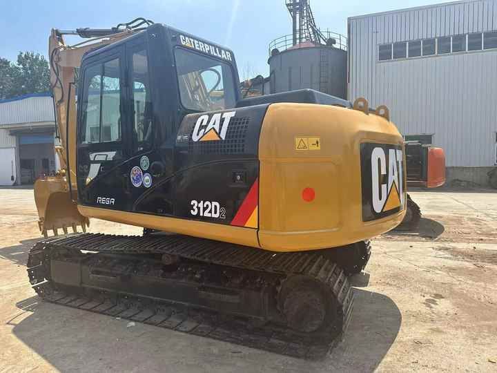 2013 Caterpillar 312D2 crawler excavator, rear three-quarter view 2013 Caterpillar 312D2 crawler excavator, rear three-quarter view