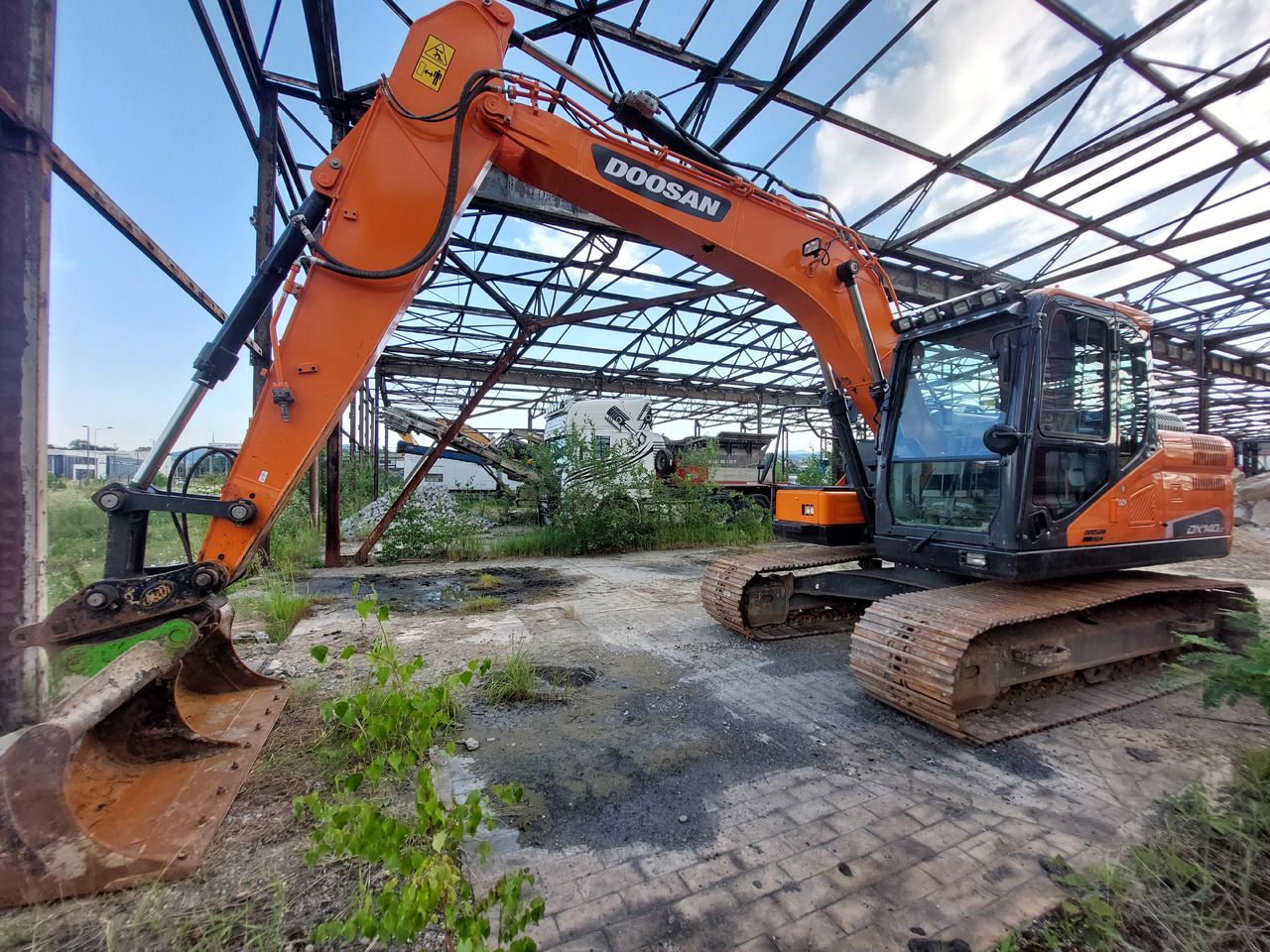 2021 Doosan DX140LC-5 crawler excavator, side profile view 2021 Doosan DX140LC-5 crawler excavator, side profile view