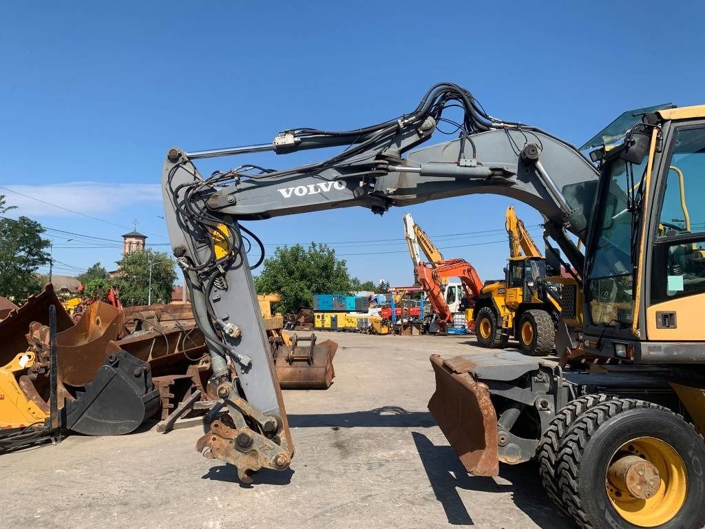 2011 Volvo EW140C wheel excavator side view 2011 Volvo EW140C wheel excavator side view