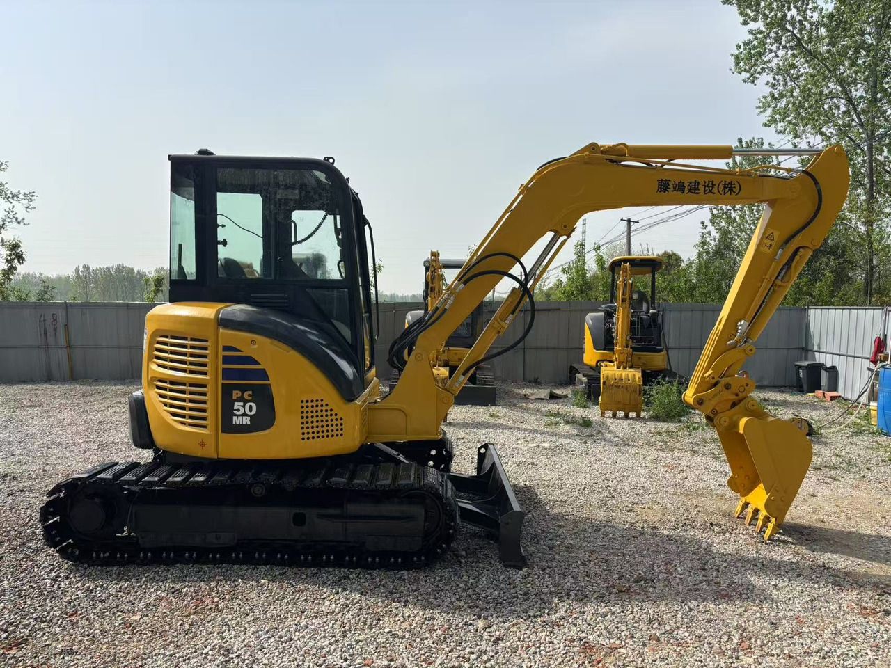 2023 Komatsu PC50MR-3 mini excavator, side view 2023 Komatsu PC50MR-3 mini excavator, side view