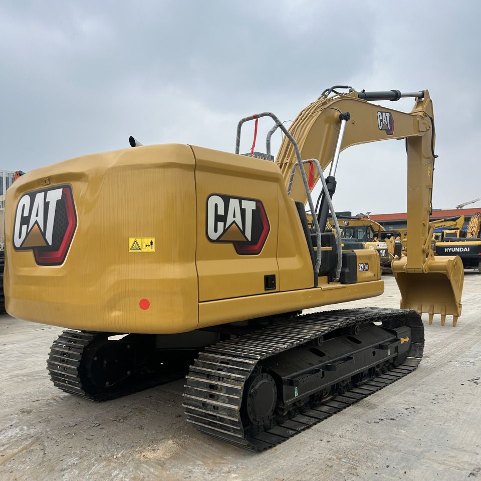 2023 Caterpillar 320GC crawler excavator, rear three-quarter view 2023 Caterpillar 320GC crawler excavator, rear three-quarter view