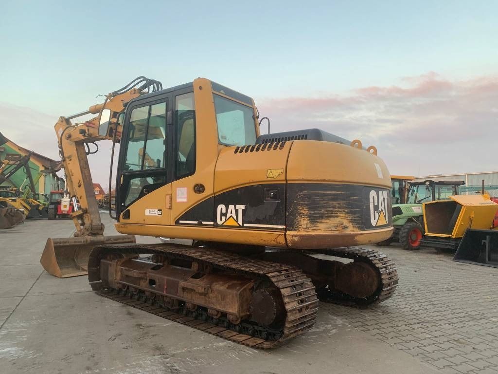 2005 Caterpillar 312C crawler excavator, rear three-quarter view 2005 Caterpillar 312C crawler excavator, rear three-quarter view