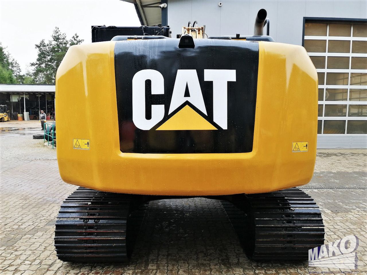 2015 Caterpillar 312E crawler excavator, rear view 2015 Caterpillar 312E crawler excavator, rear view