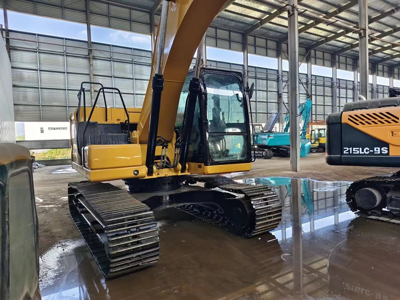 2023 Caterpillar 320GC crawler excavator, rear three-quarter view 2023 Caterpillar 320GC crawler excavator, rear three-quarter view