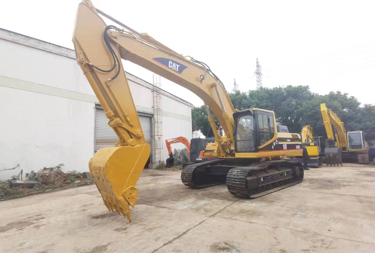 2012 Caterpillar 330BL crawler excavator, front three-quarter view 2012 Caterpillar 330BL crawler excavator, front three-quarter view