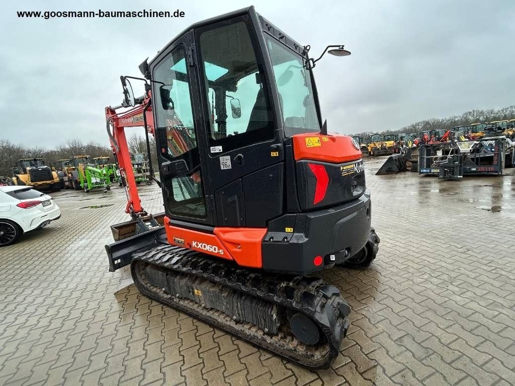 2023 Kubota KX060-5 mini excavator, rear three-quarter view 2023 Kubota KX060-5 mini excavator, rear three-quarter view