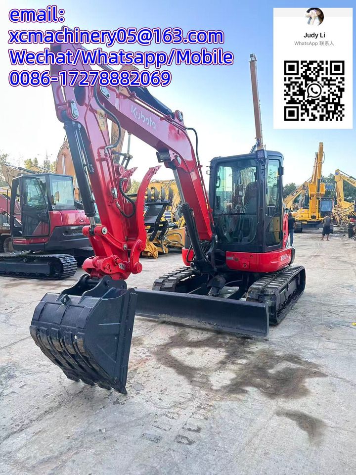 2023 Kubota KX057-4 mini excavator, front three-quarter view 2023 Kubota KX057-4 mini excavator, front three-quarter view