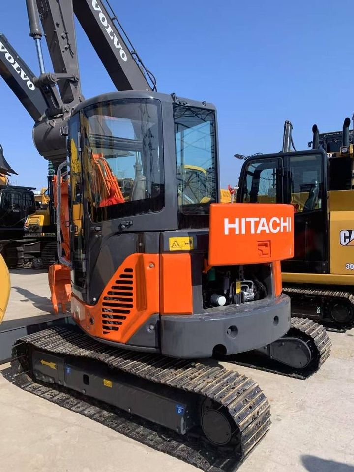 2025 Hitachi ZX55 mini excavator, rear three-quarter view 2025 Hitachi ZX55 mini excavator, rear three-quarter view