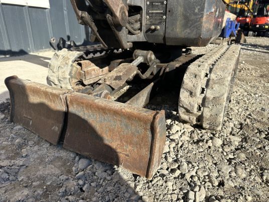 2018 Bobcat E08 mini excavator front view of blade and tracks 2018 Bobcat E08 mini excavator front view of blade and tracks