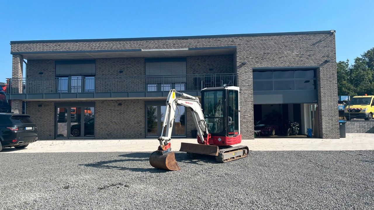 2018 Takeuchi TB23R mini excavator, front three-quarter view 2018 Takeuchi TB23R mini excavator, front three-quarter view