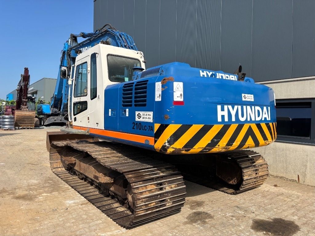 2009 Hyundai R210LC-7A crawler excavator, rear three-quarter view 2009 Hyundai R210LC-7A crawler excavator, rear three-quarter view
