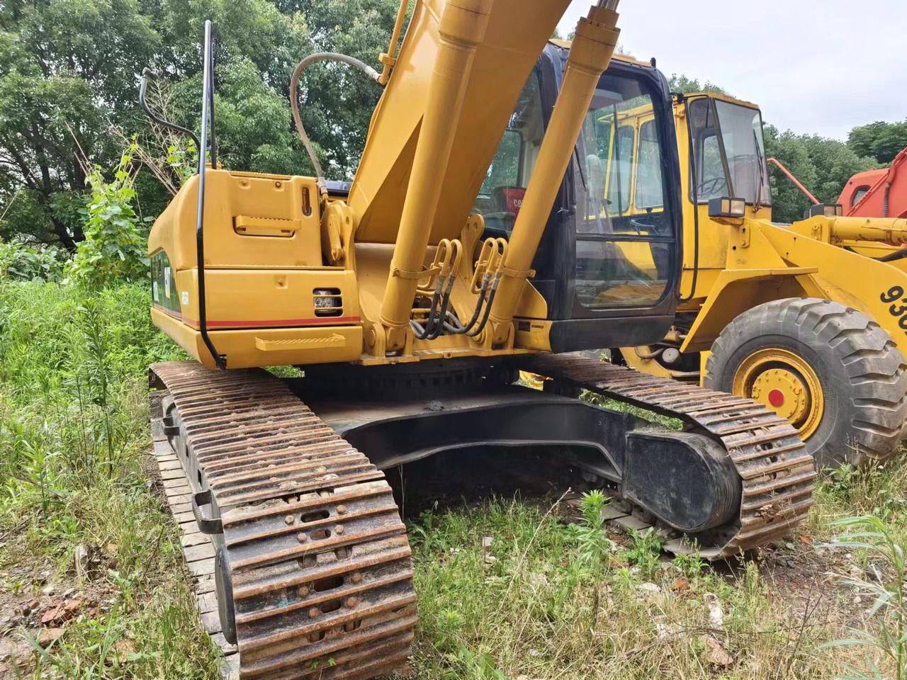 2018 Caterpillar 325C crawler excavator, rear three-quarter view 2018 Caterpillar 325C crawler excavator, rear three-quarter view