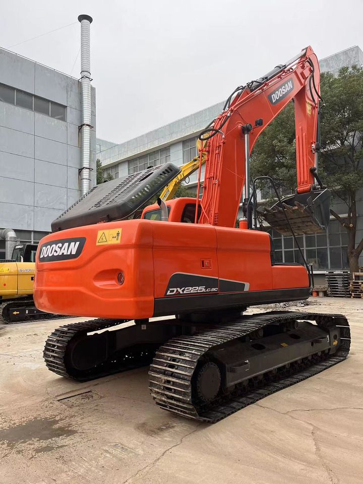 2022 Doosan DX225LC-9C crawler excavator, rear three-quarter view 2022 Doosan DX225LC-9C crawler excavator, rear three-quarter view