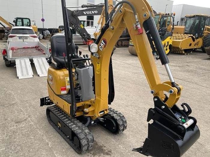 2021 Caterpillar 300.9D mini excavator, side view 2021 Caterpillar 300.9D mini excavator, side view