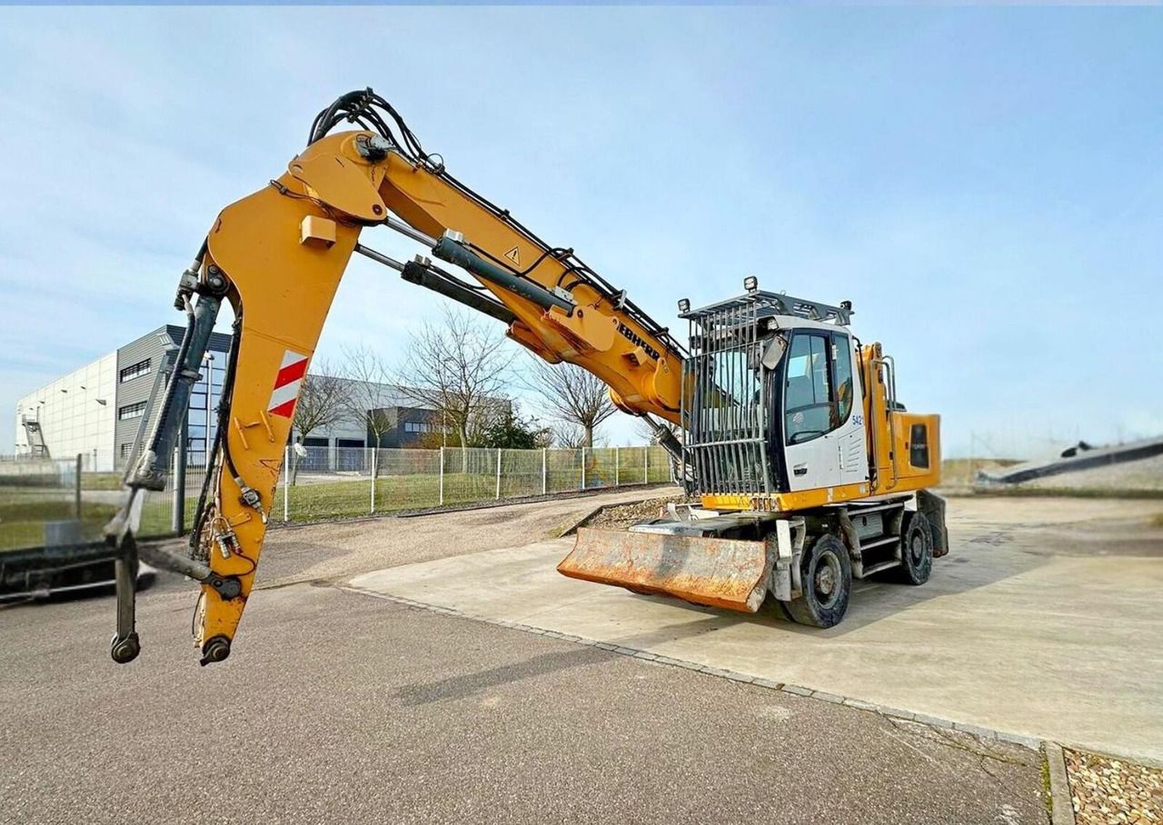 2015 Liebherr LH22 M material handler, front three-quarter view 2015 Liebherr LH22 M material handler, front three-quarter view