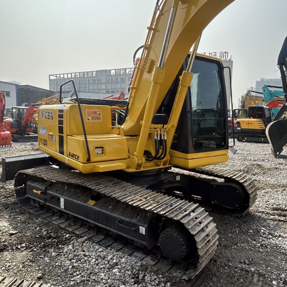 2022 Komatsu PC120 crawler excavator, rear three-quarter view 2022 Komatsu PC120 crawler excavator, rear three-quarter view