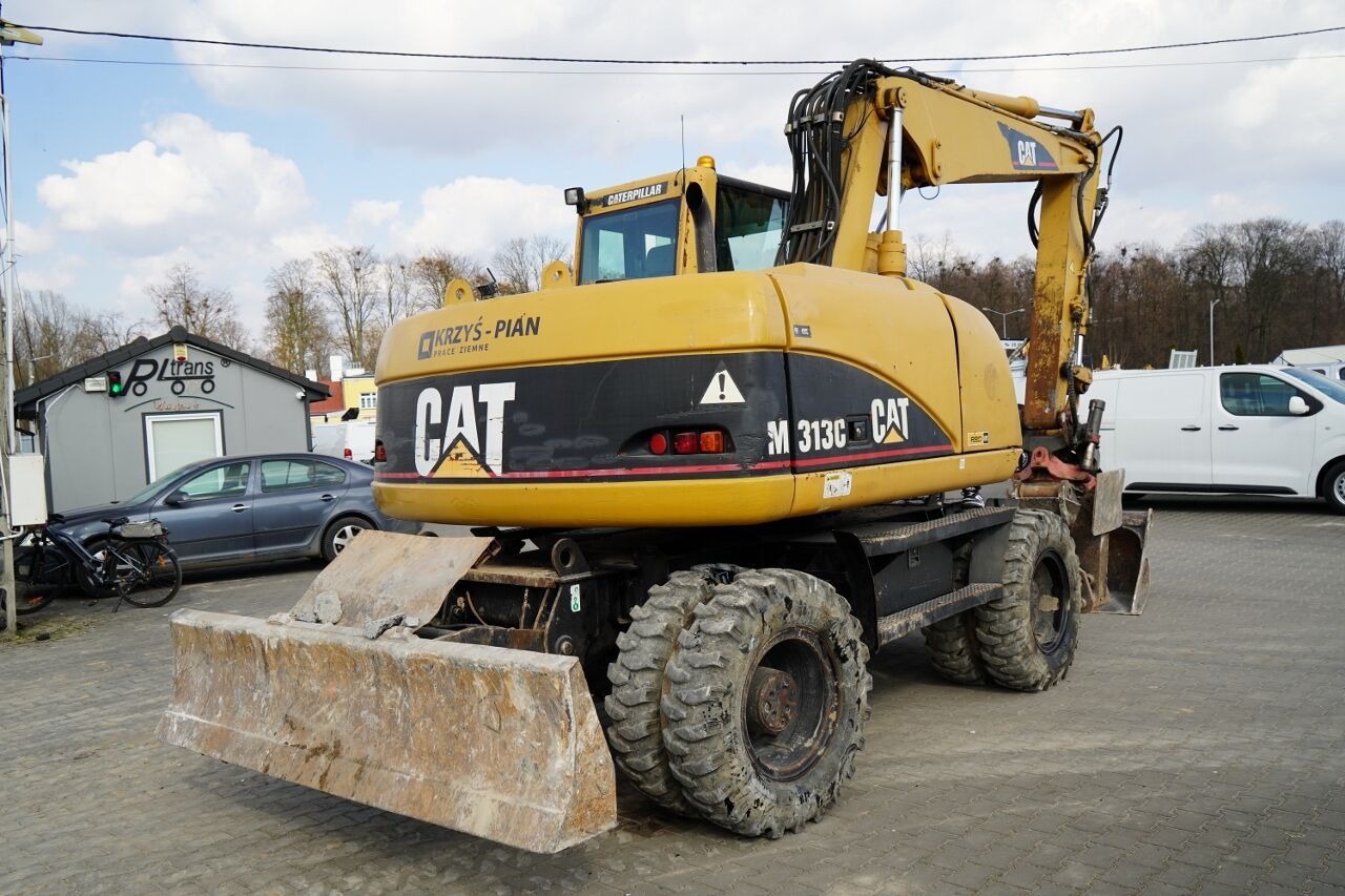 Pelle sur roues Caterpillar M313C de 2003 Pelle sur roues Caterpillar M313C de 2003