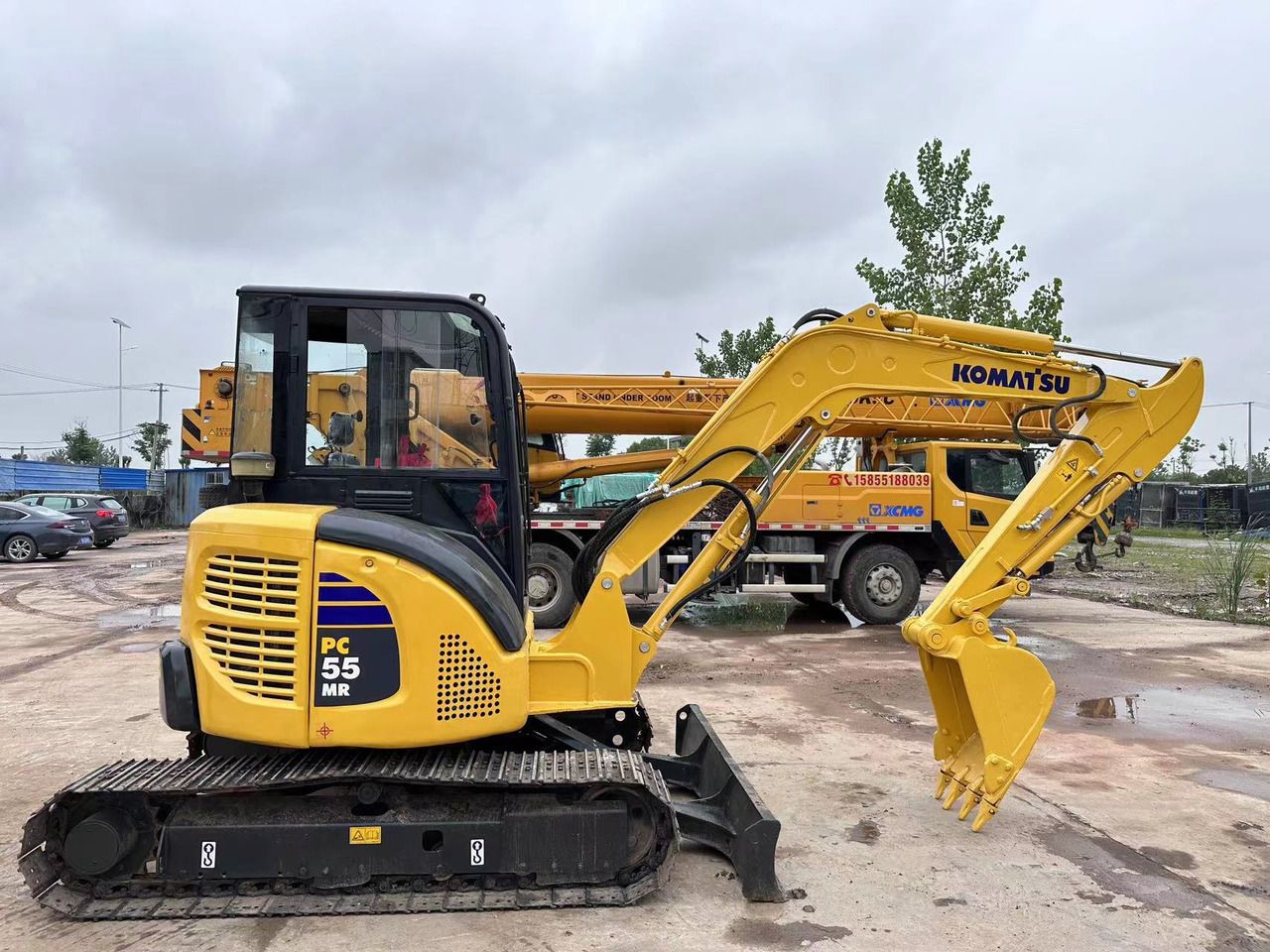2024 Komatsu PC-55MR mini excavator, side view 2024 Komatsu PC-55MR mini excavator, side view