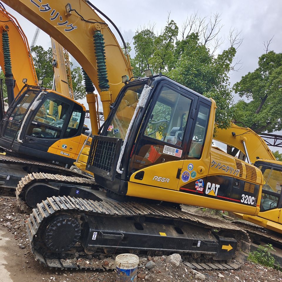 Гусеничний екскаватор 2023 Caterpillar 320CL, вид збоку