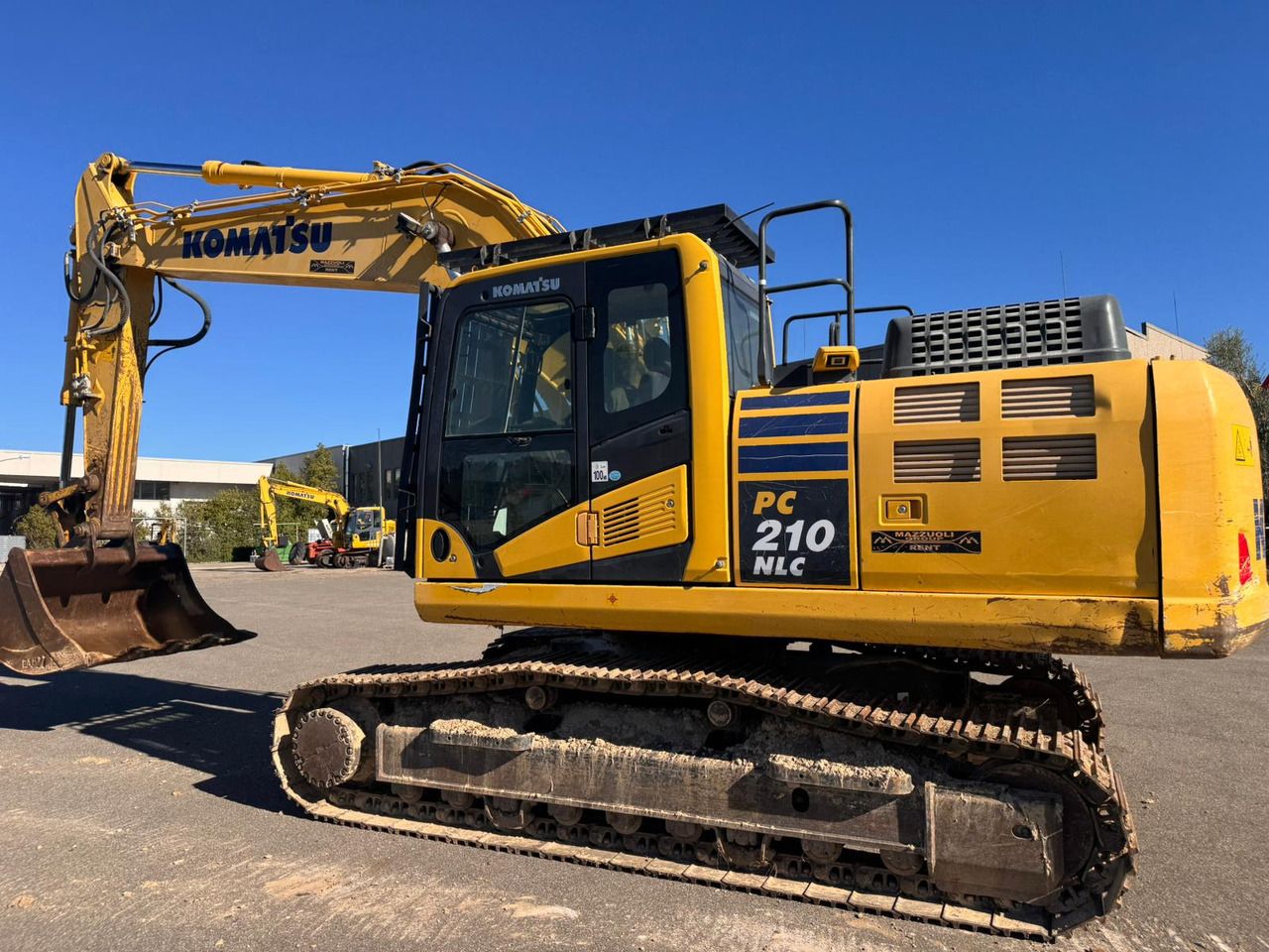 2019 Komatsu PC210 NLC-11 excavator side view 2019 Komatsu PC210 NLC-11 excavator side view