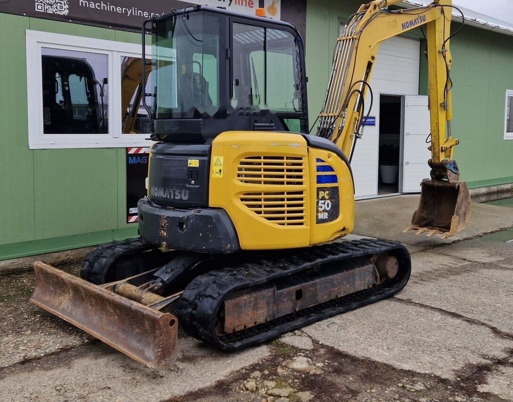 2016 Komatsu PC50MR-2 mini excavator, rear three-quarter view 2016 Komatsu PC50MR-2 mini excavator, rear three-quarter view
