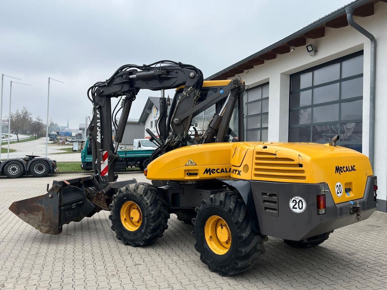 2010 Mecalac 12MTX wheel excavator, side view