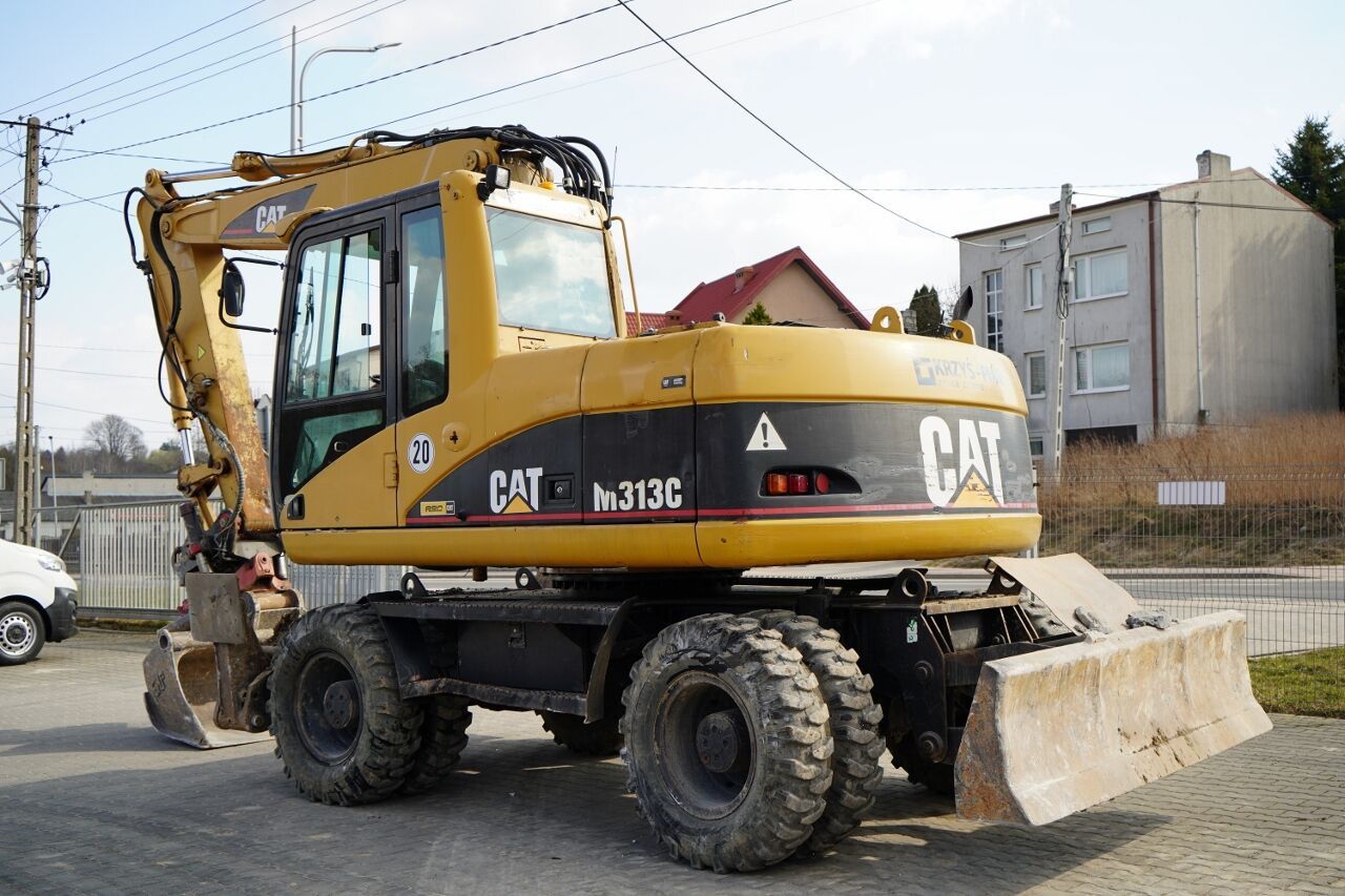 Pelle sur roues Caterpillar M313C de 2003 Pelle sur roues Caterpillar M313C de 2003