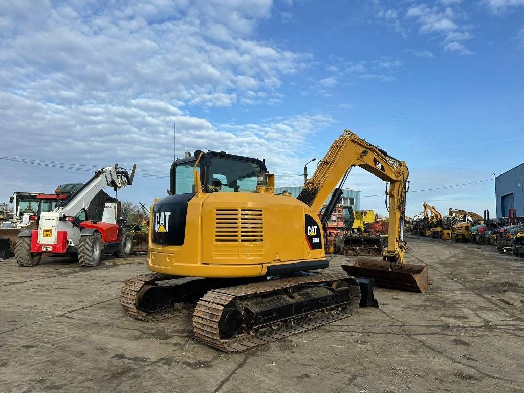 2015 Caterpillar 308E mini excavator, rear three-quarter view 2015 Caterpillar 308E mini excavator, rear three-quarter view