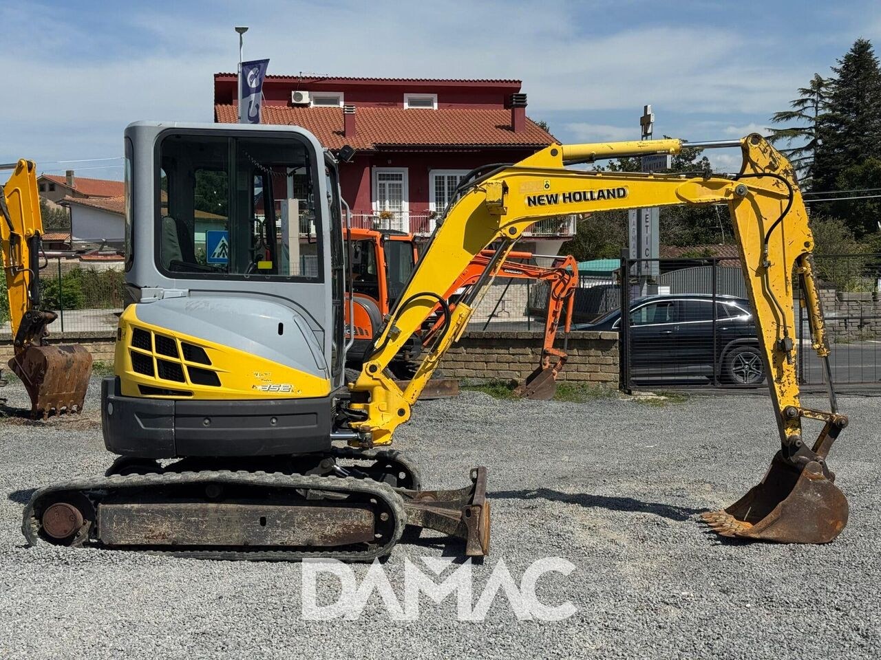 2006 New Holland E352SR mini excavator, side view 2006 New Holland E352SR mini excavator, side view