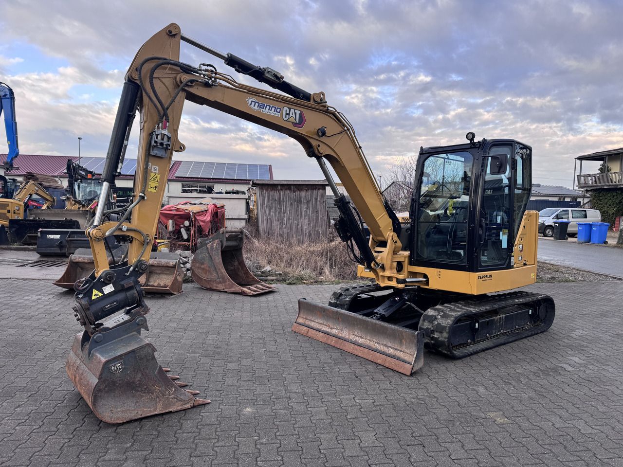 2022 Caterpillar 306CR mini excavator, side view 2022 Caterpillar 306CR mini excavator, side view