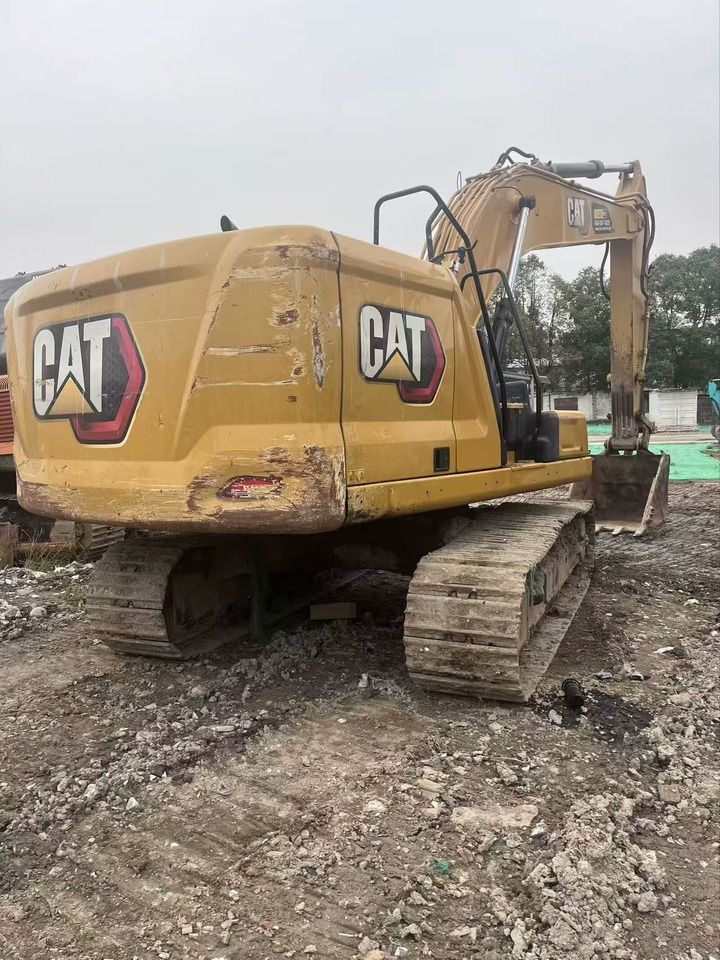 2021 Caterpillar 320GC crawler excavator, rear three-quarter view