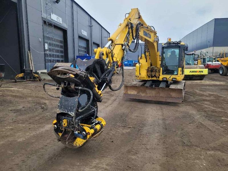 2017 Komatsu PC138US-11 crawler excavator, front three-quarter view 2017 Komatsu PC138US-11 crawler excavator, front three-quarter view