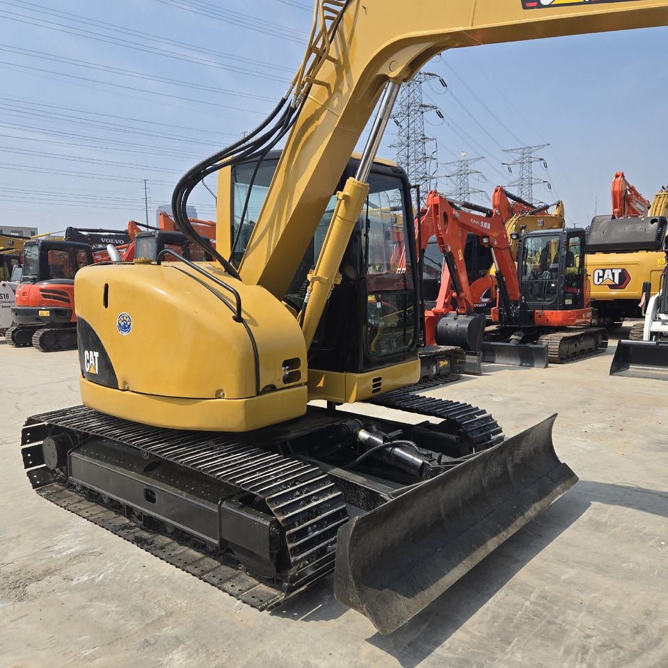 2022 Caterpillar 308C mini excavator, rear three-quarter view