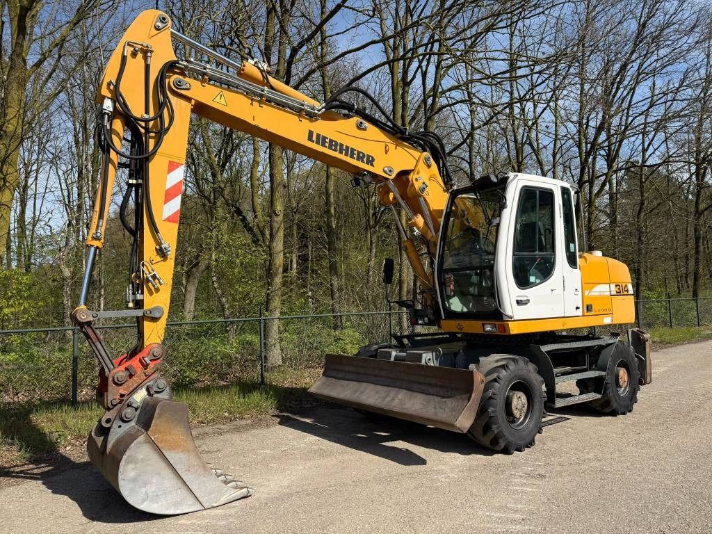 2008 Liebherr A314 LITRONIC wheel excavator, side view 2008 Liebherr A314 LITRONIC wheel excavator, side view