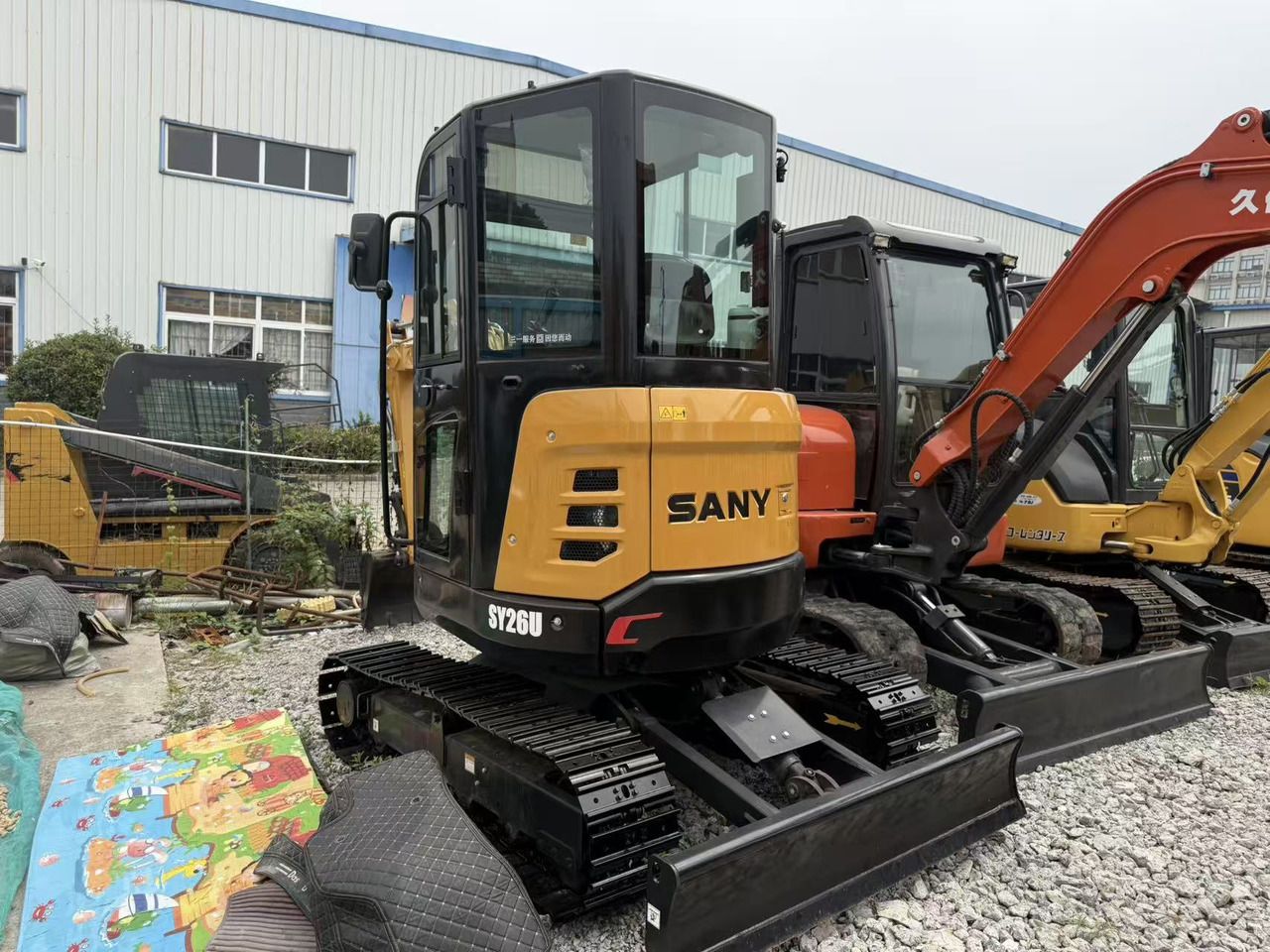 2025 Sany SY26U mini excavator, front three-quarter view