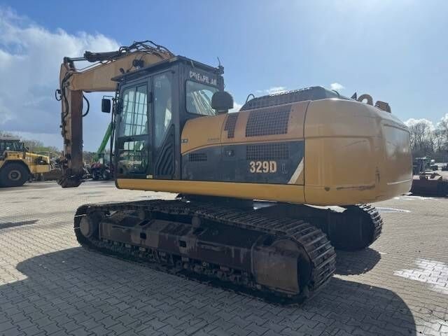 2010 Caterpillar 329D crawler excavator, side view 2010 Caterpillar 329D crawler excavator, side view