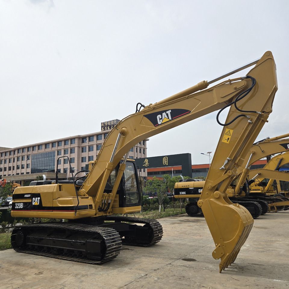 1998 Caterpillar 320B crawler excavator side view