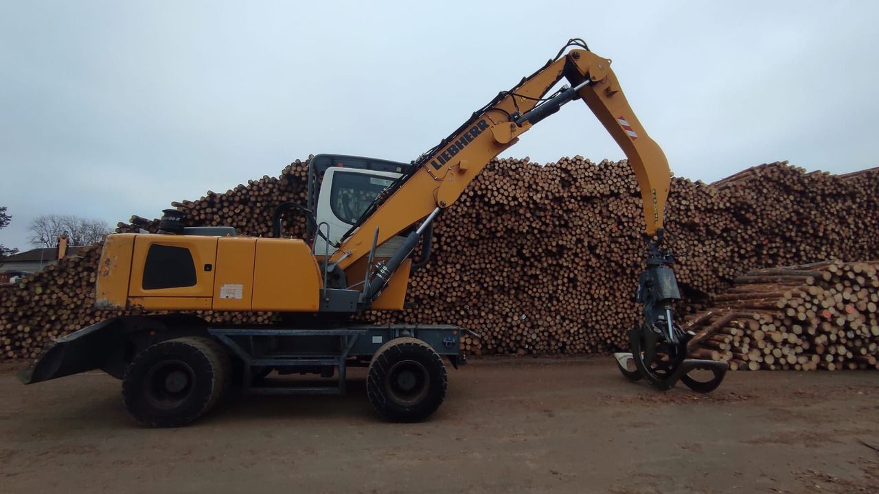 2015 Liebherr LH35 M material handler side view 2015 Liebherr LH35 M material handler side view